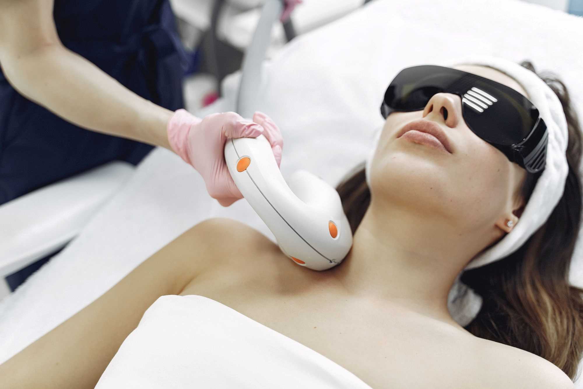 Woman undergoing laser hair removal