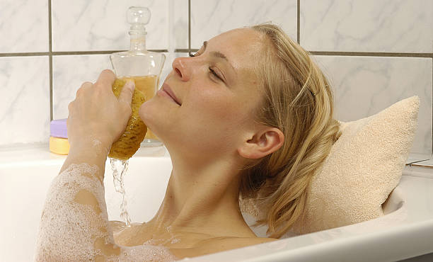 woman washing her hairs with wine